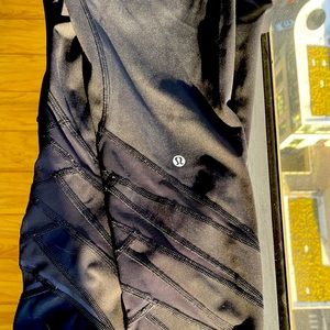 SOLD: Lululemon Black Leggings with designs around the ankles